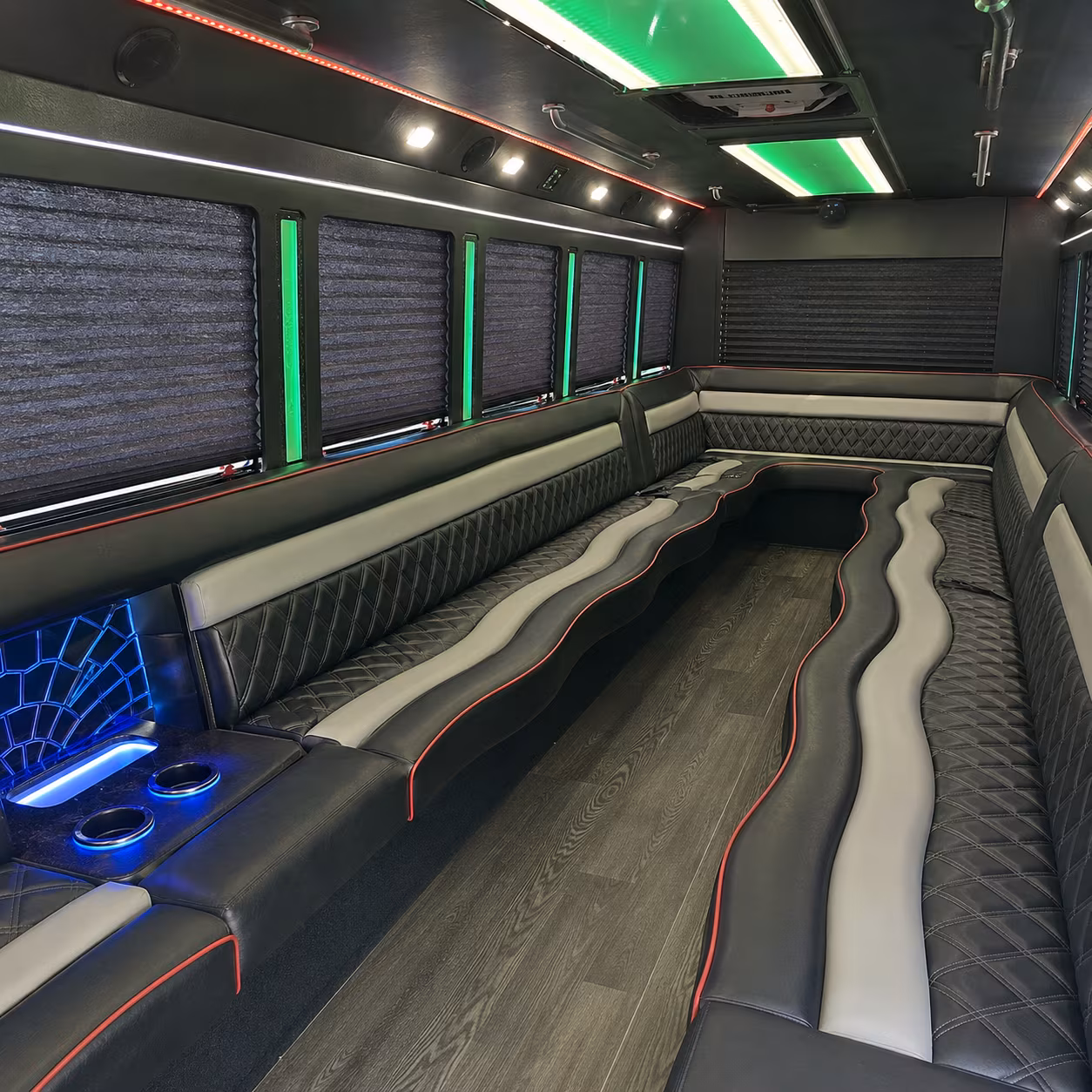 Group beside a Mercedes Sprinter limo in Detroit