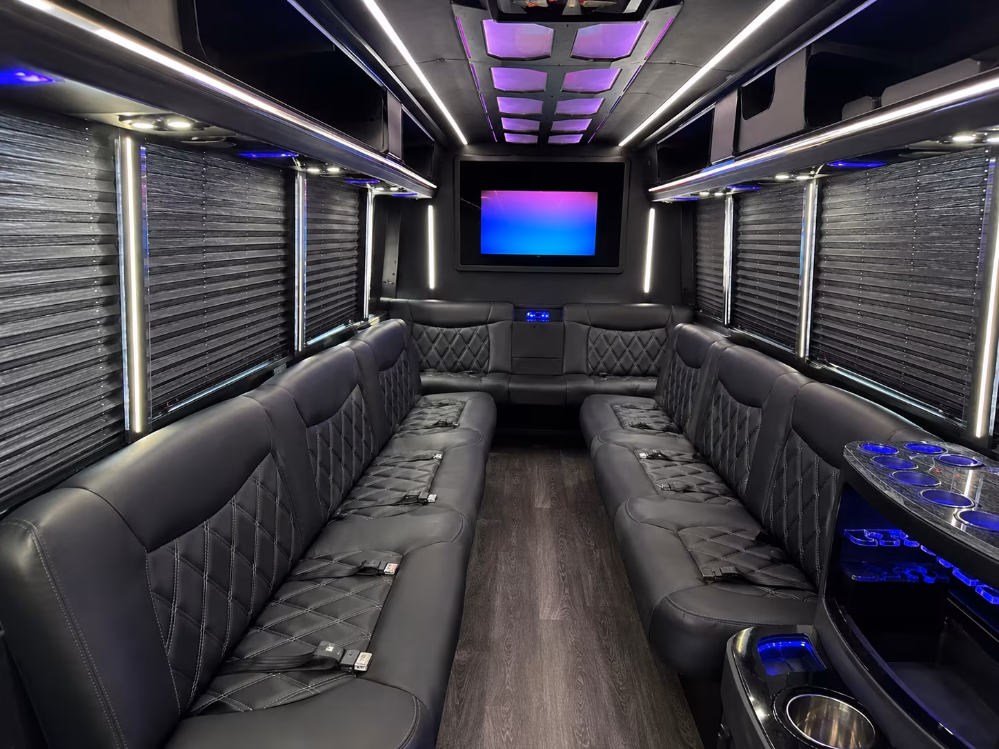 Wraparound seating inside a party bus rental serving Detroit